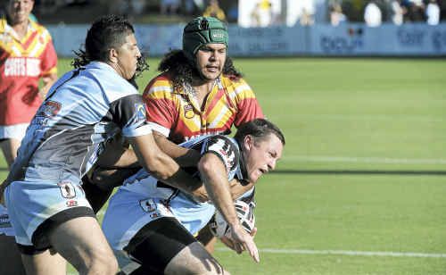 Woolgoolga recruit Mark Pledger fails to find a way through the Coffs Harbour line during Saturday night’s final of the Group 2 Sevens. Woolgoolga recruit Mark Pledger fails to find a way through the Coffs Harbour line during Saturday night’s final of the Group 2 Sevens.